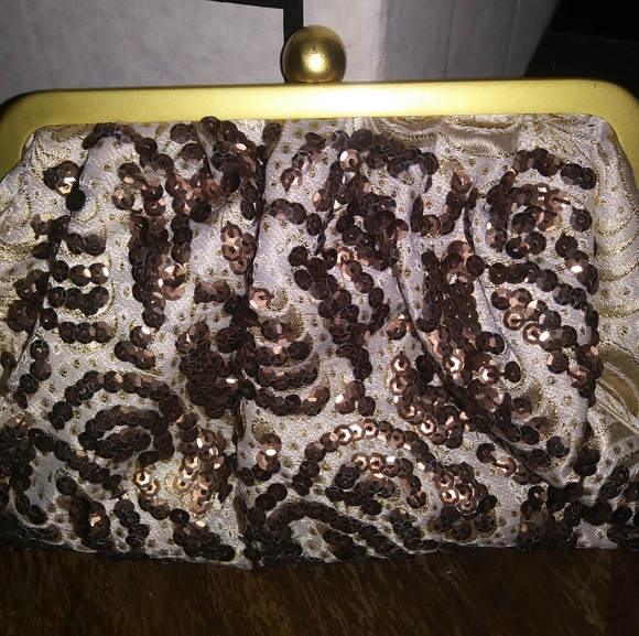 Handbags - Like new clutch decorated with gold sequins